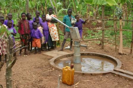 Villagers using the borehole